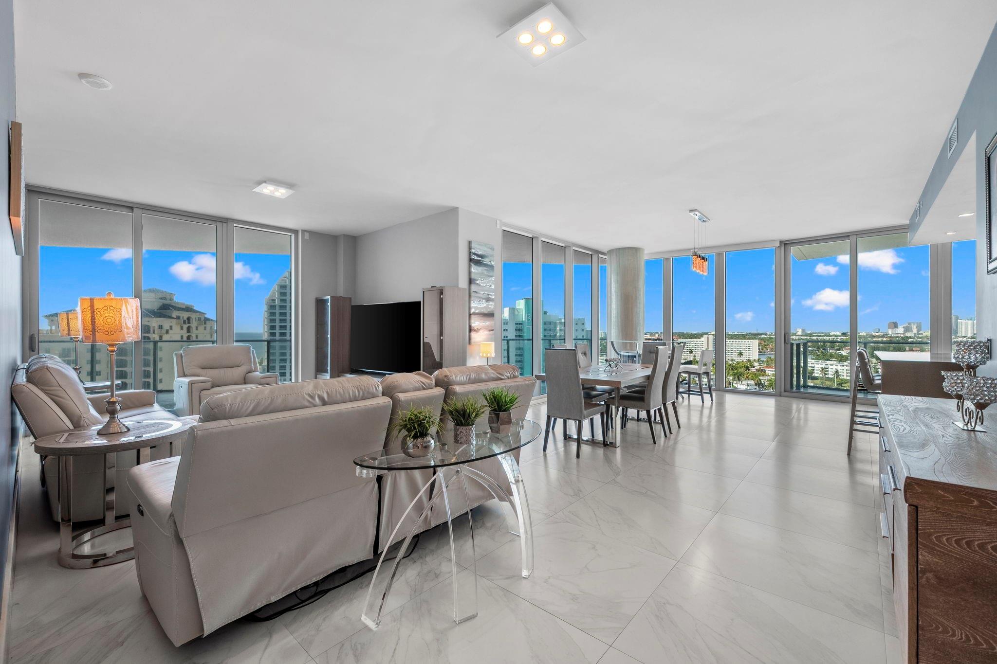Command the Very Best Ocean, Intracoastal, and City views from this rare highest-floor SW CORNER residence available, where soaring ceilings and a private foyer entrance create true exclusivity. From Sunrise over the Atlantic to Sunset across the water and skyline, every room is filled with natural light and sweeping Views! This 3-bed/3.5-bath home features a wraparound terrace ideal for coffee at dawn or sunset entertaining. The open kitchen showcases a waterfall island, Sub-Zero & Wolf appliances, and refined finishes. Floor-to-ceiling glass, recessed lighting, and motorized shades enhance the design. Paramount offers boutique privacy and resort-style amenities, just steps from the sand, dining, and entertainment. Turnkey option available. Schedule your showing today!