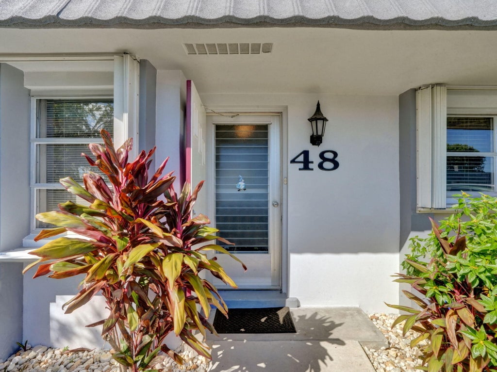 Photo of 2886 Fernley Drive E #48, West Palm Beach, FL 33415 (MLS # B26088461)