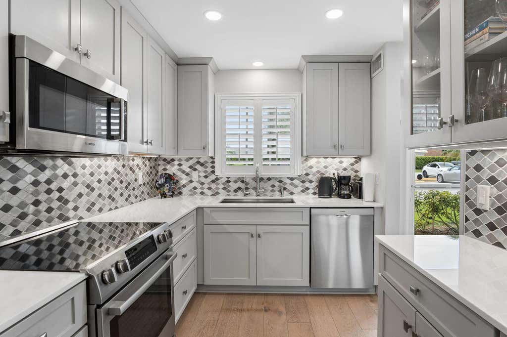 Photo of 157 Atlantis Boulevard #103, Atlantis, FL 33462 (MLS # B26037395)