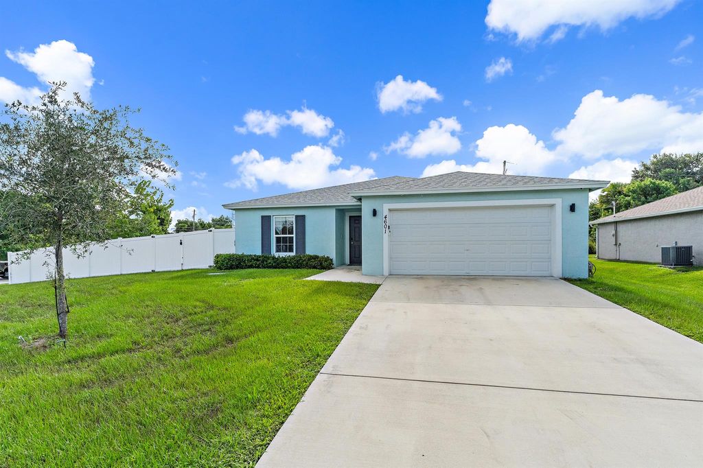 Photo of 4601 SW Scanavino Street, Port Saint Lucie, FL 34953 (MLS # R11117970)