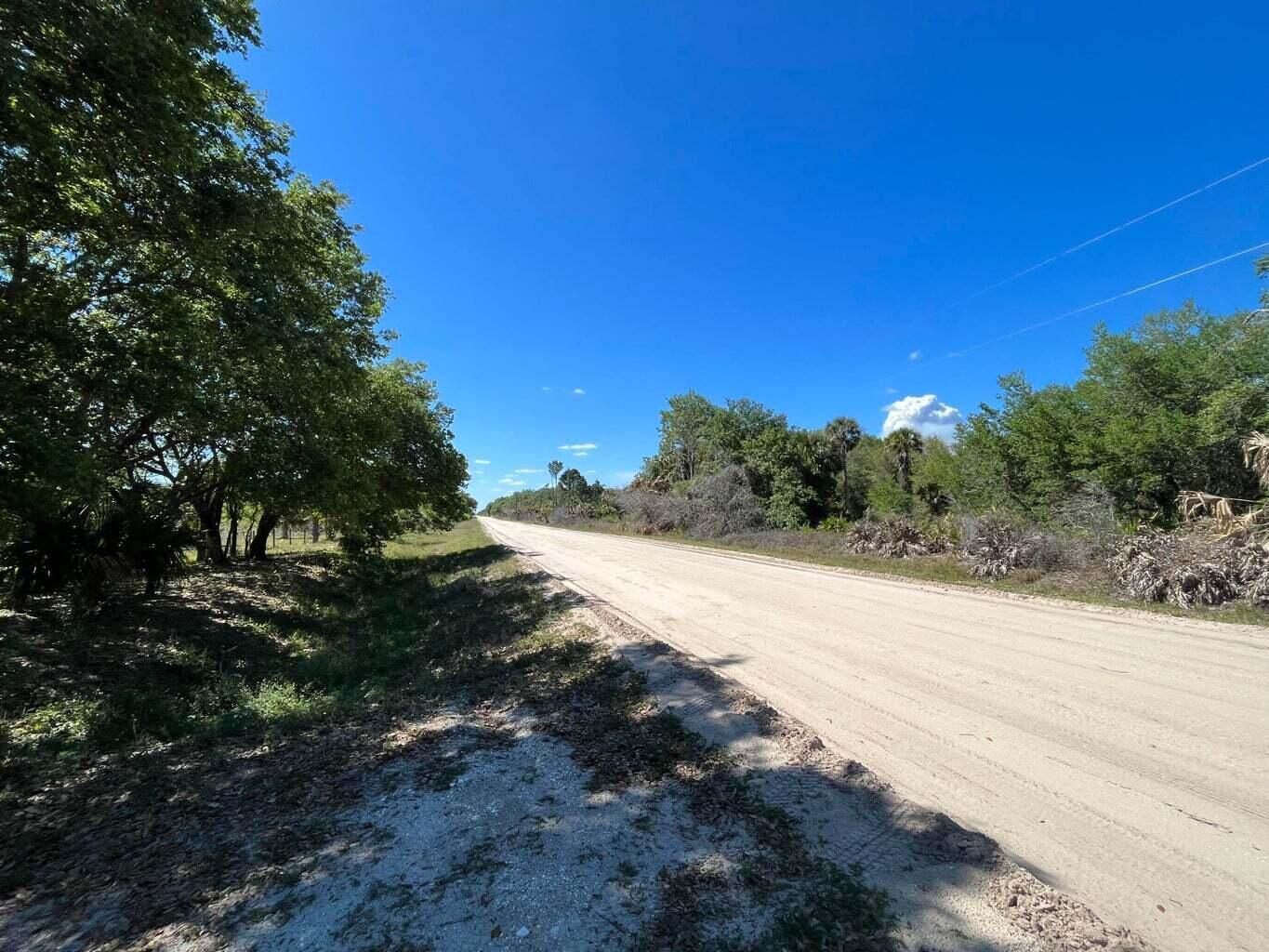 Build or bring your dream home on this beautiful high dry and cleared private 5-acre lot. It is completely fenced and cross fenced with a 25x 25 pole barn. The property already has power and a well. You can access the property from 302nd and 304th. There is so much to enjoy in Okeechobee County. Come to The Kissimmee River Preserve State Park West of this area as well is the Kissimmee River. The Kissimmee River flows into Lake Okeechobee and is well known for some of the best fishing. whether you like Fishing, hunting, mudding agriculture or just privacy here you have it all.