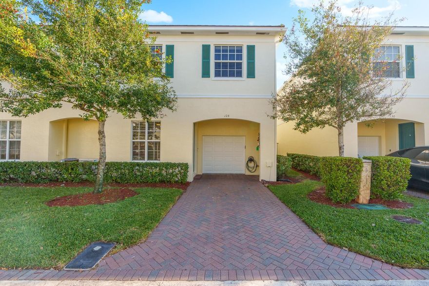 One of the most beautifully updated corner townhomes in Orchid Grove and one of the largest 3 bedroom, 2 ½ bathroom models. Hurricane impact windows and doors. Newer A/C (2022). Generator hookup. Completely upgraded kitchen with gorgeous granite countertops, modern, white cabinets, stainless steel appliances, and over/under-cabinet lighting. Wood floors throughout. Over-sized primary bedroom plus updated en-suite bathroom with separate tub and shower, dual sinks, and large closets. Bonus room, perfect for an office or den. Spacious secondary bedrooms. Washer/dryer. 1-car garage. Great, open back patio. Orchid Grove features a beautiful lake to walk/jog around, fitness center, heated pool, and clubhouse. Pet-friendly. On-site security patrol. Ideally located close to EVERYTHING.