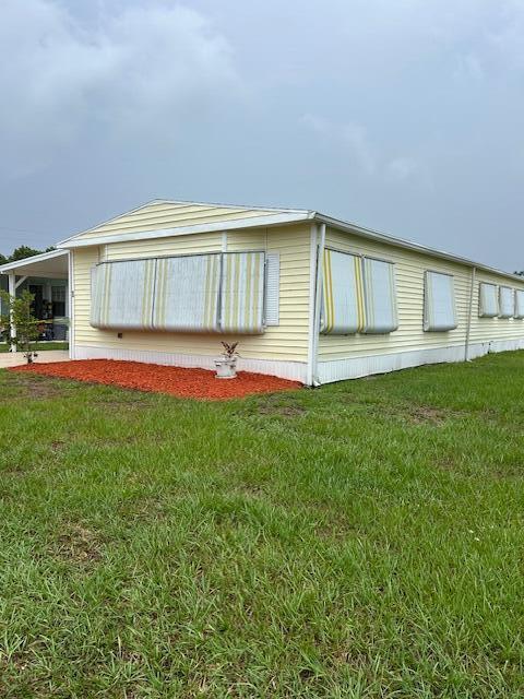 This 2 bedroom 2 bath home features newer appliances -dishwasher has never been used. Laminate floors in kitchen and dining area. Lots of space and opportunity to make this home your Florida dream. Roof is approximately 7 years old. Located near restaurants, shopping and beaches and in a 55+ community with access to the river.