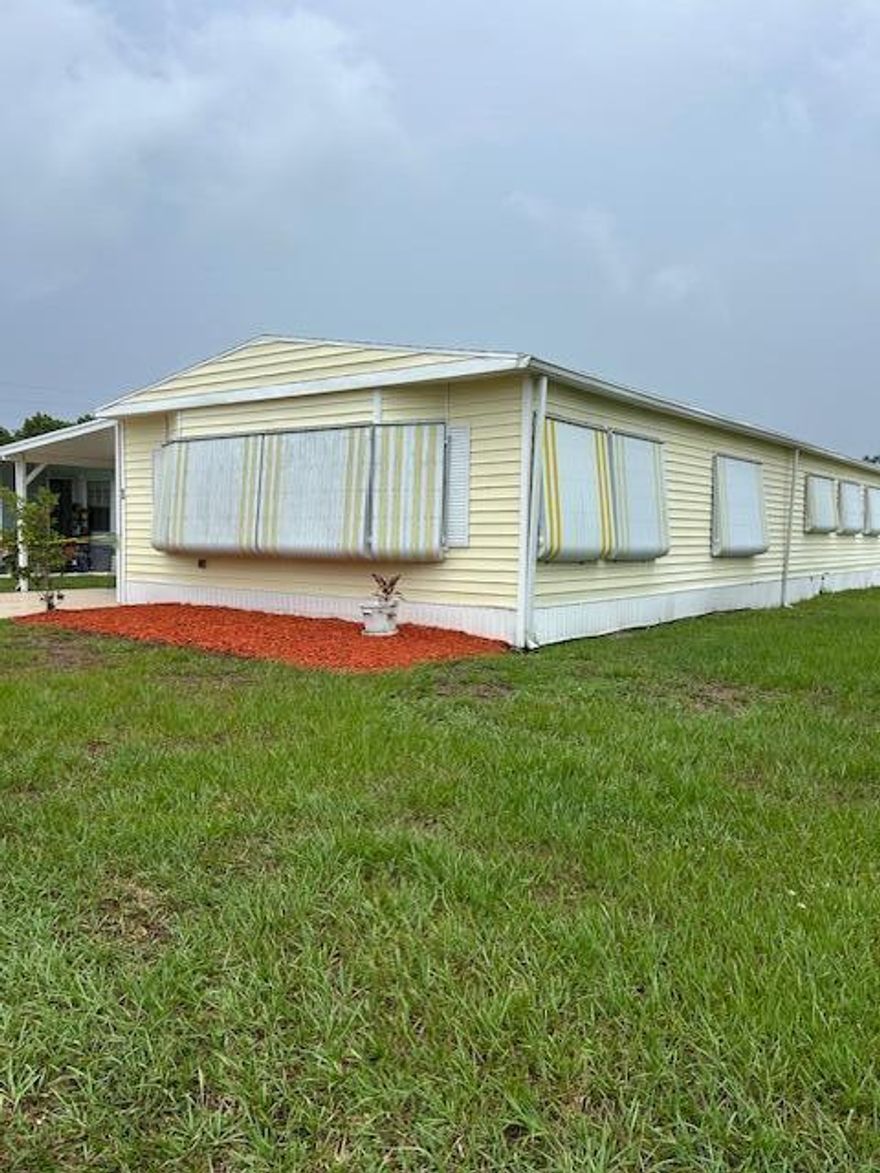This 2 bedroom 2 bath home features newer appliances -dishwasher has never been used. Laminate floors in kitchen and dining area. Lots of space and opportunity to make this home your Florida dream. Roof is approximately 7 years old. Home comes furnished. Located near restaurants, shopping and beaches and in a 55+ community with access to the river.