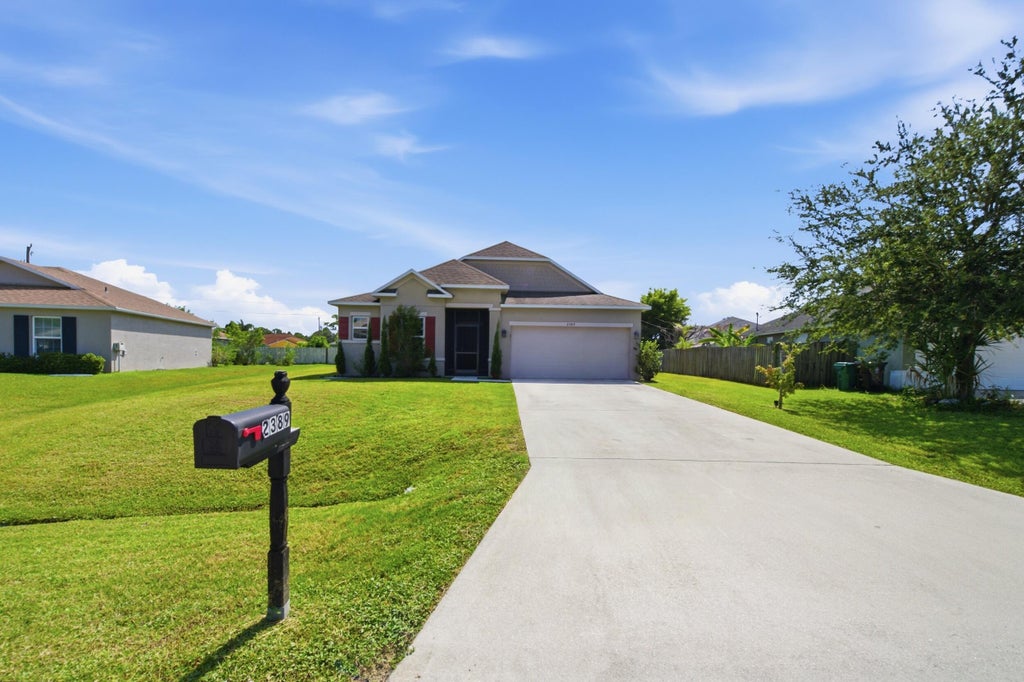 Photo of 2389 SW VALE Street, Port Saint Lucie, FL 34953 (MLS # B26067081)
