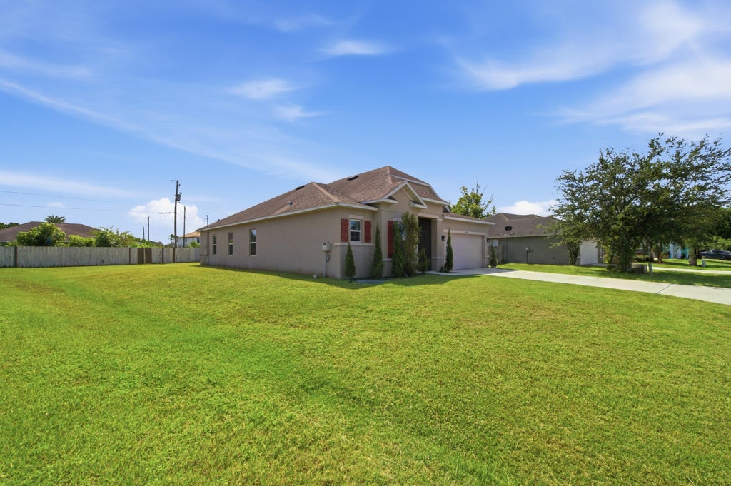 Photo of 2389 SW VALE Street, Port Saint Lucie, FL 34953 (MLS # B26067081)