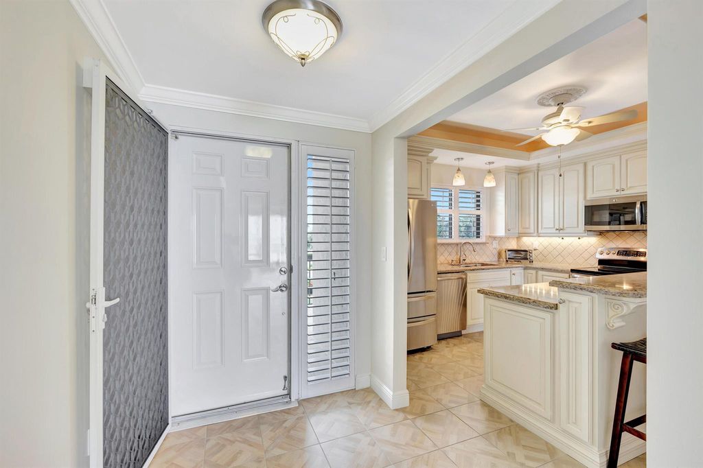 Photo of 70 Celestial Way #203, Juno Beach, FL 33408 (MLS # R11020390)