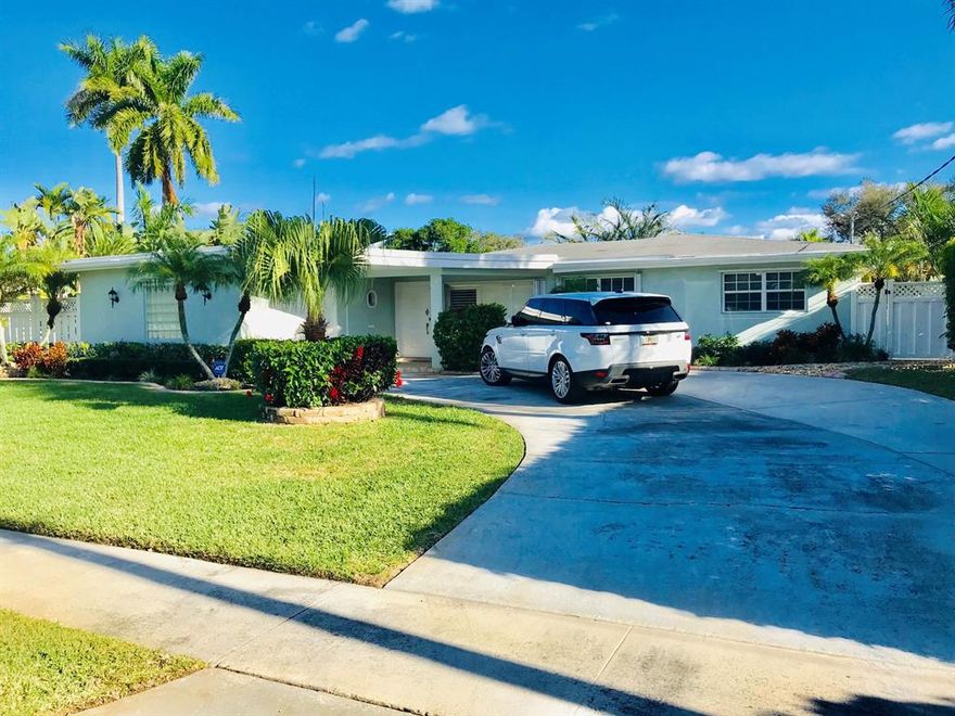BEAUTIFUL EAST BOCA WATERFRONT HOME WITH POOL!! This charming ''Coastal Chic'' 3/2 is located in the quaint neighborhood of Royal Oak Hills within a quiet cul-de-sac minutes from downtown Boca Raton and a 20 minute boat ride to the intercostal water way! Bathrooms are beautifully updated, back patio and pool area completely renovated, hurricane impact windows throughout a portion of the property, new crown molding and new baseboards throughout, expanded drive way, all new landscaping, new paint inside and out, pool with attached spa, a beautiful step down living room area overlooking the water, updated fixturing, and much more!
