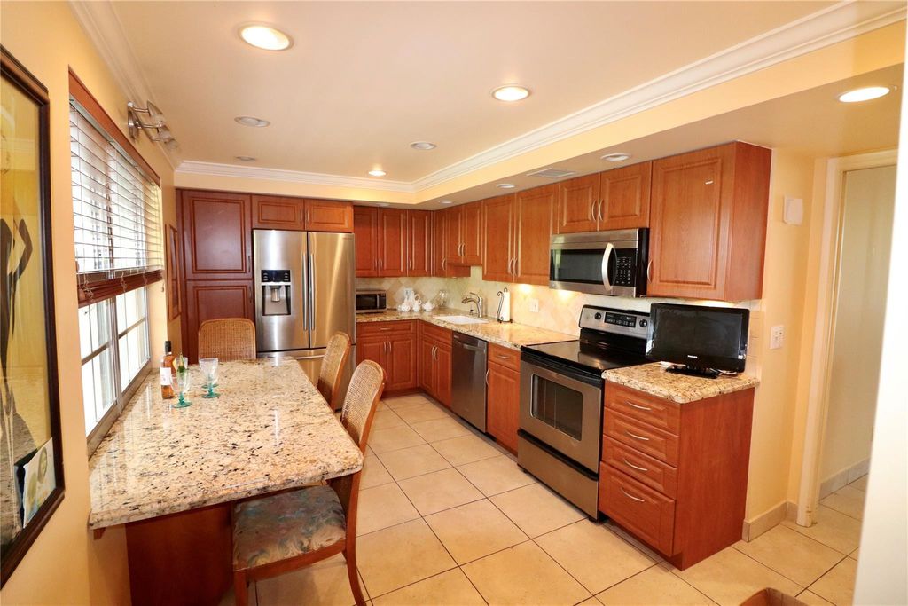 Photo of 4020 W Palm Aire Drive #403, Pompano Beach, FL 33069 (MLS # F10472230)