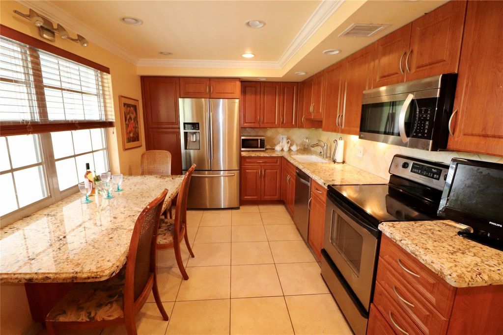 Photo of 4020 W Palm Aire Drive #403, Pompano Beach, FL 33069 (MLS # F10472230)