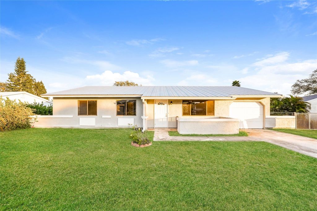 Photo of 2299 SE Rainier Road, Port Saint Lucie, FL 34952 (MLS # F10542652)