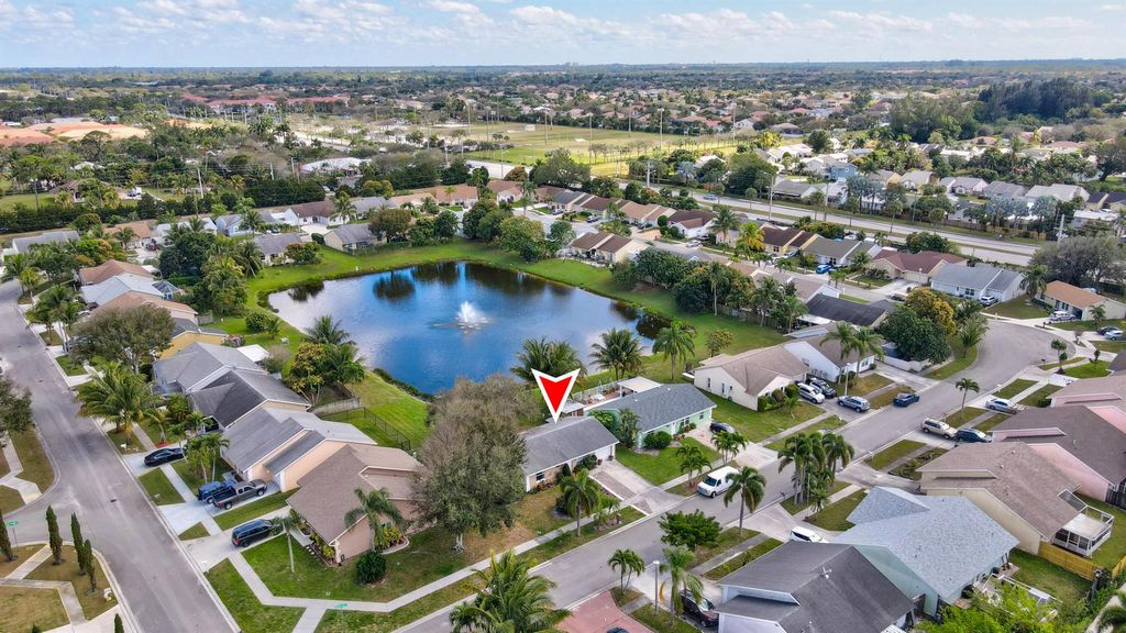 Photo of 5182 Blueberry Hill Avenue SE, Lake Worth, FL 33463 (MLS # R11085411)