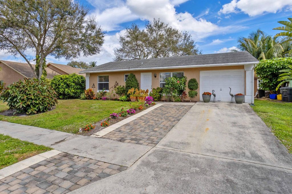 Photo of 5182 Blueberry Hill Avenue SE, Lake Worth, FL 33463 (MLS # R11085411)