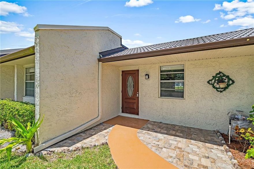 This gorgeous completely renovated 2/2 villa is move-in ready and overlooks the lake! Everything was recently updated and painted, no popcorn ceiling here! Kitchen features beautiful white cabinets & granite countertops, brand-new stainless steel appliances and LED lights. Both bathrooms completely redone! Tile floors throughout while primary bedroom has lovely views of the lake. Enjoy a nice evening on the enclosed patio. Washer & dryer inside unit. A/C 2014, WH 2018. Fabulous clubhouse, workout facilities, large pool, spa, tennis and shuffleboard and so much more for active seniors. Bus service to shopping & medical plazas. One person must be 55+. This phase B allows 1 pet per unit under 30 pounds. Basic cable & water included in the monthly dues. One year of ownership prior to renting.