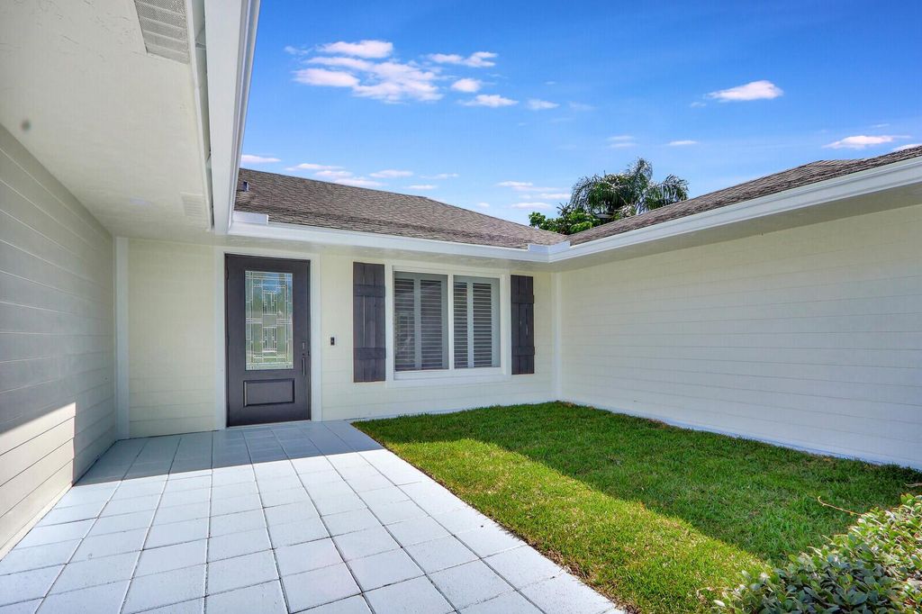Photo of 21 SE Paddock Circle, Tequesta, FL 33469 (MLS # R10947223)