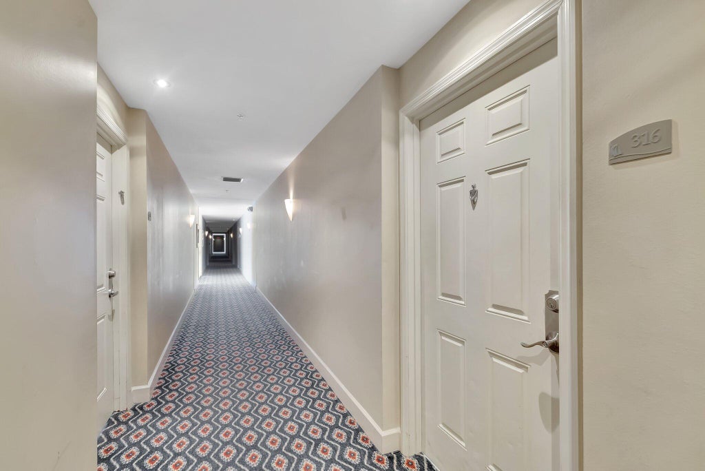 Photo of 802 W WINDWARD Way #316, Lantana, FL 33462 (MLS # B26064622)