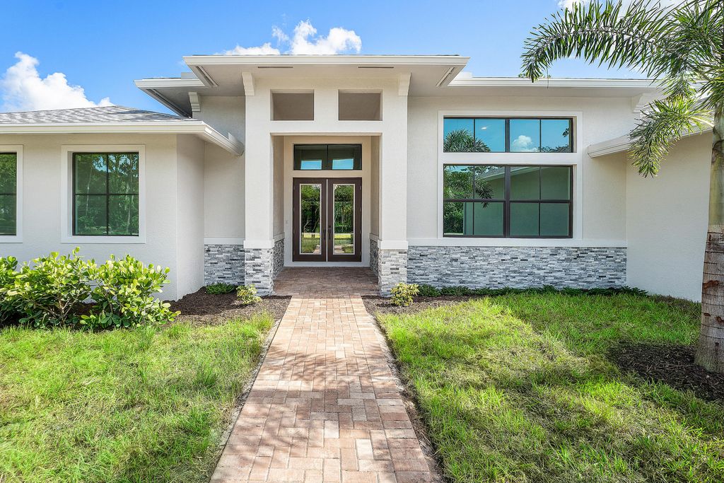 Photo of 11701 153rd Court N, Jupiter, FL 33478 (MLS # B26047215)