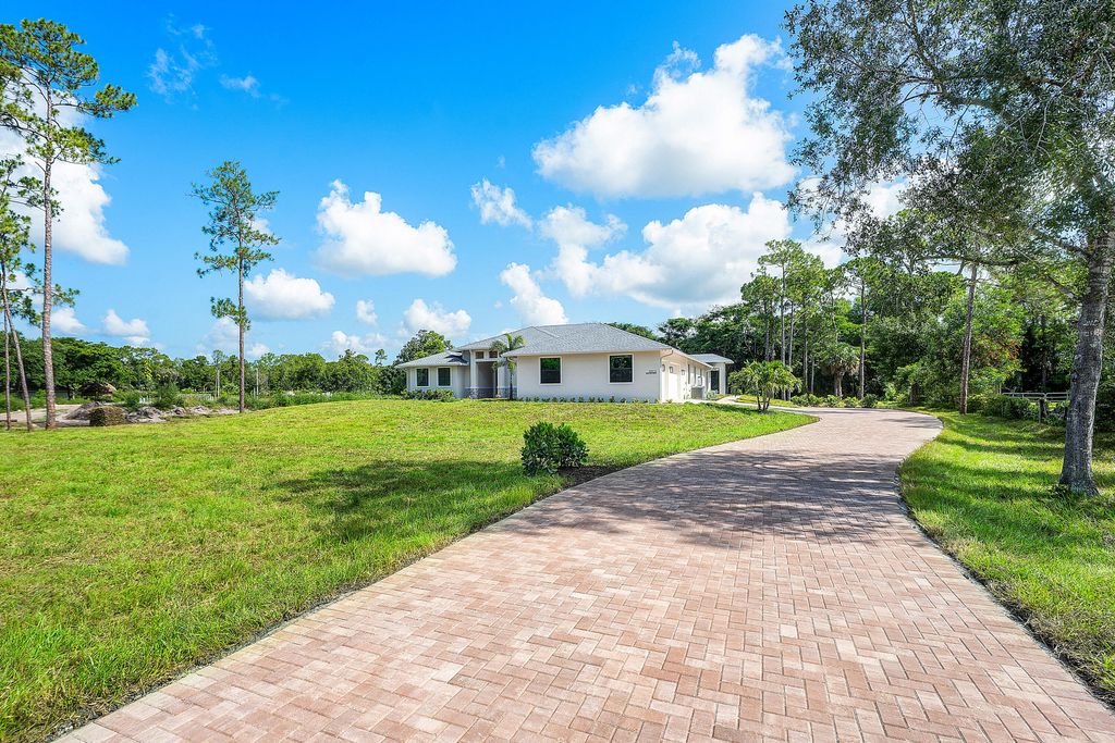 Photo of 11701 153rd Court N, Jupiter, FL 33478 (MLS # B26047215)