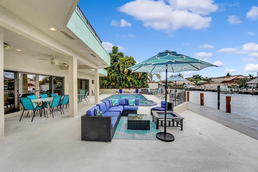 Delray Beach! @4000SQFT! Bring Offers! Yacht Dock! 5 min to Beaches! Ocean Access, No fixed Bridges, Wide 115' Intracoastal Canal for larger Yachts. Jet Ski Docks. Kayaking, Paddle Board, Fishing. * Executive Home Delivers Water Views & Amazing Sunsets. Heated Saltwater Pool & Spa w/ Separate Hot Tub & Cabana. 3 CAR GARAGE w/ Circular Drive! HOA Voluntary, NO HOA  FEES! *2-story foyer & 2 large living rms. 2 Master Bedrooms! Master on main w/ ensuite + bidet & jetted tub. Spacious loft. 2nd Master BR & Balcony. All bedrooms w/ California closets & water views. Kitchen w/ granite island & wine bar. Open kitchen window to the outside patio bar. 4 HVAC units & smart home security. Patio Plumbed for Kitchen ''Delray Voted Most fun small town in US by ''Rand McNally & USA today'