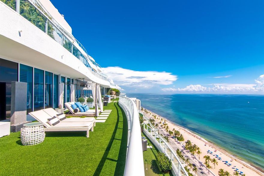 This Direct Oceanfront Residence at the Prestigious Ritz-Carlton Fort Lauderdale features 4,703 total square feet comprising of three bedrooms, three full baths and one half bath. Step outside to the 1674 square foot private terrace overlooking the glistening Atlantic Ocean. Custom designer kitchen, Italian cabinetry, wood flooring throughout, Custom movie theater, wine cellar, his and hers Custom bathrooms and closets, and floor to ceiling glass windows throughout. Enjoy all of the Ritz-Carlton amenities, including a Resort style pool, Fitness center, full restaurant and bar, and 24 hour security.