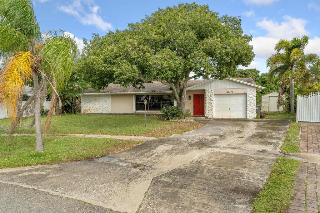 Photo of 3517 N Libby Drive, West Palm Beach, FL 33406 (MLS # R10936654)