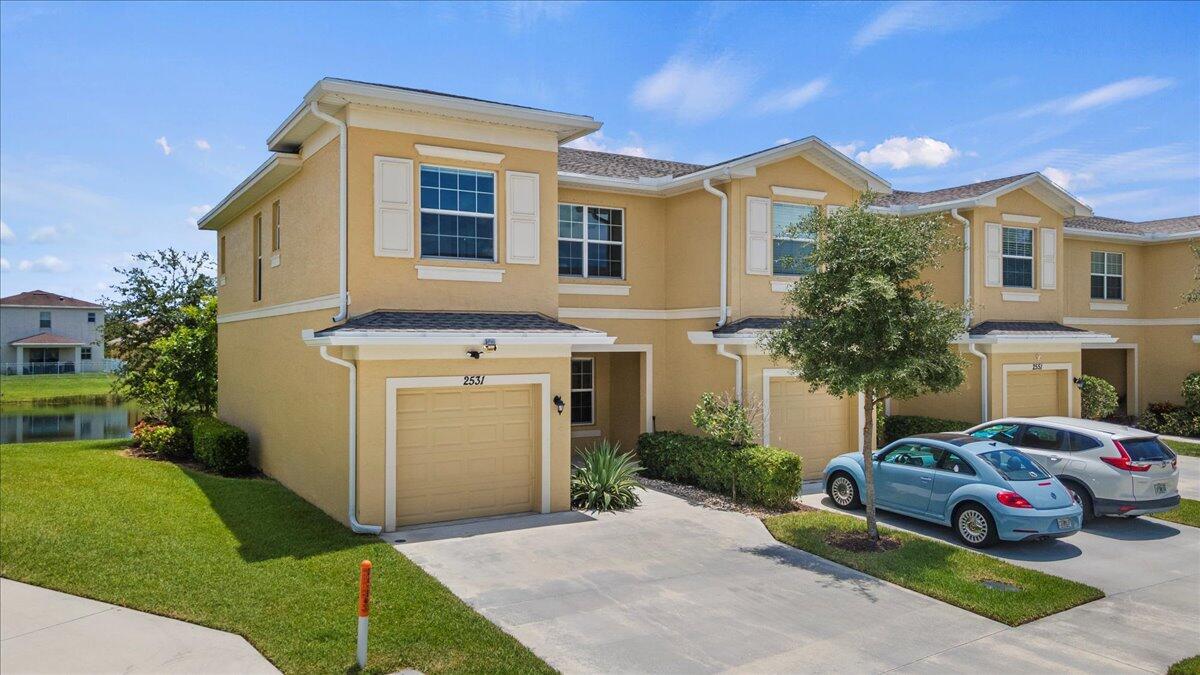 Beautiful Waterfront corner Townhouse with good outside space . Built in 2020, this 3 bedroom, 2 1/2 bathroom and one car garage is light and bright with a lot of windows. The owner removed the builder carpets and put brand new luxury flooring upstairs. You have a good size pantry, large walk-in closet in the primary bedroom. Come see it, you will not be disappointed. The HOA covers a wide range of services and amenities designed to simplify daily living, from exterior upkeep and landscaping to access to the clubhouse, pool, and sports courts, offering you peace of mind and more time to enjoy your home. All information and measurements to be verified buy the buyer.