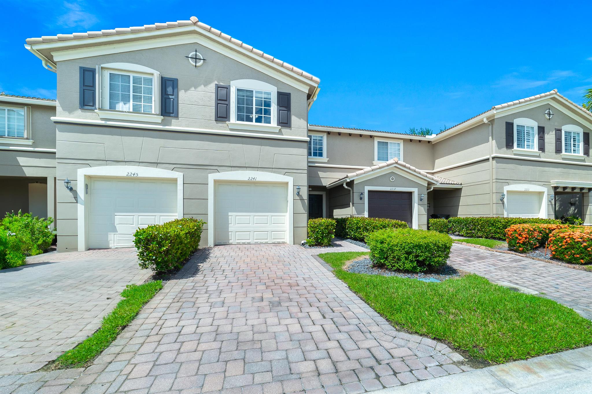 Welcome to this beautifully updated two-story townhome in the desirable gated community of Newport Isles. The home has been freshly painted and features new appliances along with a one-car garage. The main level showcases an open floor plan with tile flooring, a convenient half bath, and a private backyard with no rear neighbors--perfect for relaxing while enjoying the views of lush trees and native birds. Upstairs, you'll find vinyl flooring throughout, a spacious primary suite with a walk-in closet and private bath, plus two additional bedrooms and a full bathroom. Washer and dryer hook-ups are included for convenience. Newport Isles offers an impressive array of amenities, including