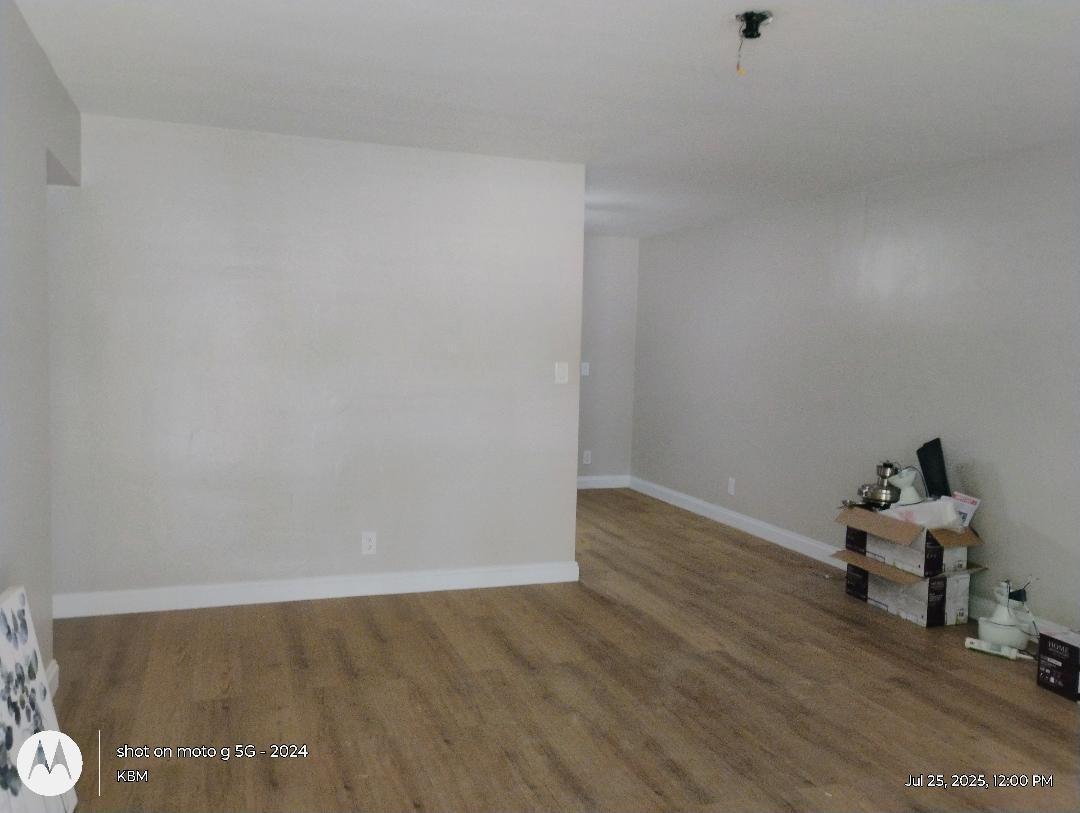 Nicely updated 3 Br 2 Bath unit with ample parking. Can accommodate a large work vehicle.New tile and laminate floors throughout. Beautiful new baths. Very large covered patio. Good school district.