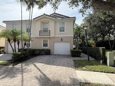 Photo of 230 FORTUNA Drive, Palm Beach Gardens, FL 33410 (MLS # B26059793)