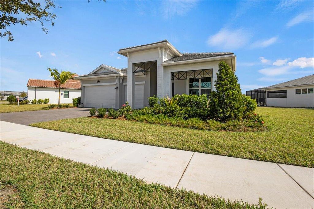 Photo of 8580 SW Cantante Way, Port Saint Lucie, FL 34987 (MLS # R11138834)