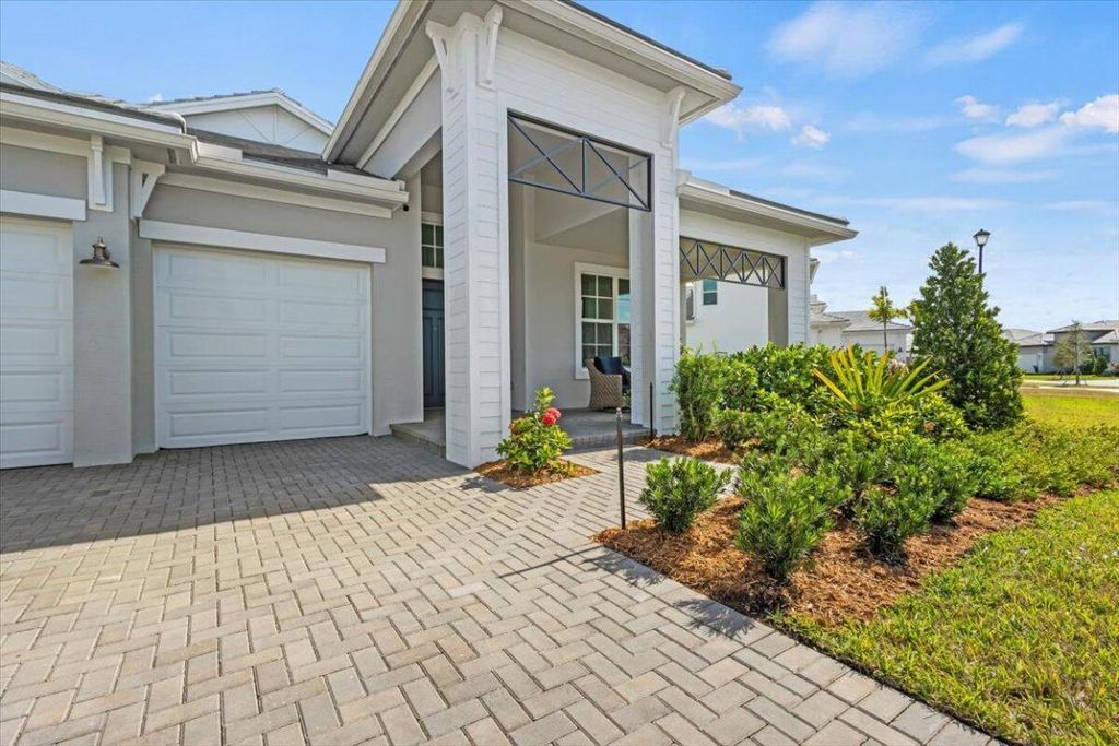 Photo of 8580 SW Cantante Way, Port Saint Lucie, FL 34987 (MLS # R11138834)