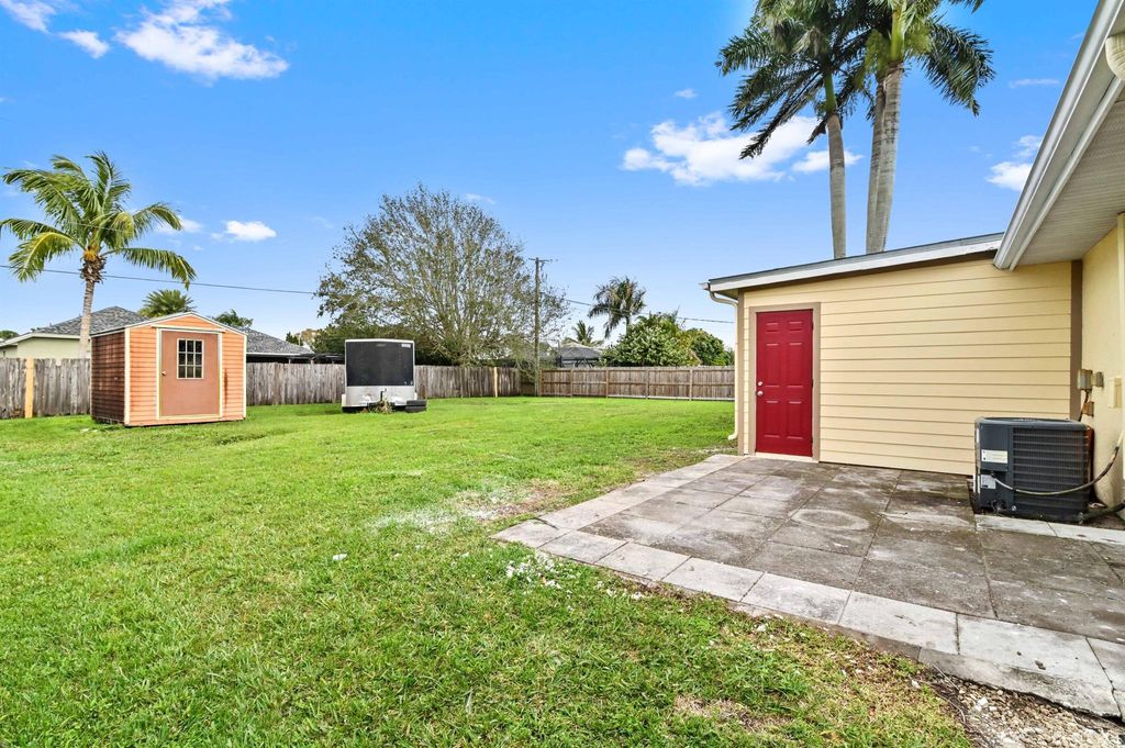 Photo of 541 SW Fairview Avenue, Port Saint Lucie, FL 34983 (MLS # R10953594)