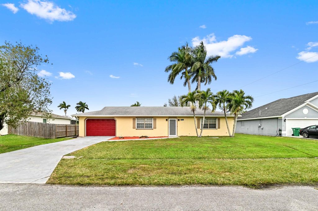 Photo of 541 SW Fairview Avenue, Port Saint Lucie, FL 34983 (MLS # R10953594)