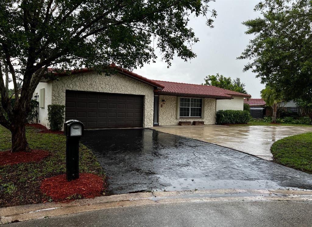 Photo of 4270 107th Avenue, Coral Springs, FL 33065 (MLS # F10513877)