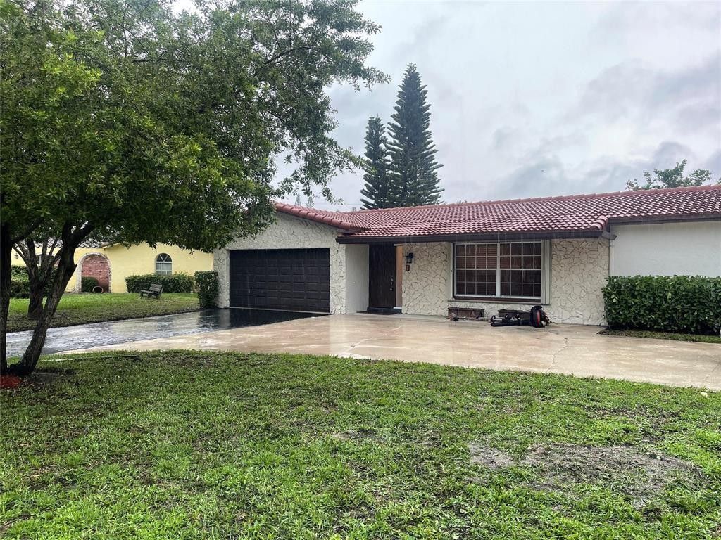 Photo of 4270 107th Avenue, Coral Springs, FL 33065 (MLS # F10513877)