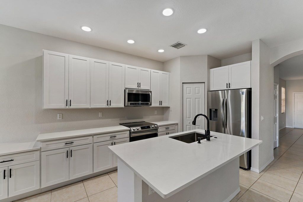 Photo of 4986 Bonsai Circle #104, Palm Beach Gardens, FL 33418 (MLS # R10794907)