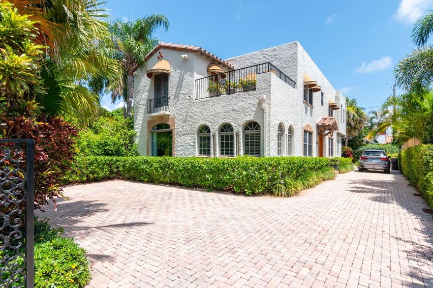 Introducing an exceptional 1924 home in ''EL Cid'', a beautiful historic neighborhood that sits along the Intercoastal Waterway. This 1924 home was built in the Mediterranean Revival style of Architecture and is inspired by comfort, sophistication, and charm.  The property is one of the larger properties within El Cid, a masterpiece that epitomizes the charm and architectural brilliance tucked within this prestigious neighborhood. This manicured property features a poolside guest cottage, has five bedrooms, five full baths and one-half baths, a garage, and enough parking space for six cars plus street parking. The open and bright kitchen has, Thermador appliances, Mexican tile floors, fine cabinetry, crown moldings, and a wine refrigerator/bar. The formal dining room is directly adjacent to the kitchen. A generous foyer from the entrance opens to a spacious formal living room with French doors that connects to the garden terrace, which is adjacent to the library and a cocktail/tearoom.  A large family room with French doors provides views of and access to the pool and the landscaped gardens. The main bedroom and ensuite bathroom are located upstairs with a sunny main balcony and a Juliette balcony.  Three additional guest bedrooms are located upstairs, one with a dedicated bathroom, and two sharing a Jack and Jill bathroom. This lush tropical property has numerous fountains, a pool, a jacuzzi, a Koi Pond, a waterfall, and a substantial poolside entertaining space with colorful and tropical gardens sitting. 
The charming Guest house includes a kitchen, one bedroom, a living room, and one bathroom.  
This property is available for the first time in 15 years. Elementary school is within the Palm Beach Island school district. The Breakers, Worth Ave, Rosemary Square, and all cultural centers are minutes away.