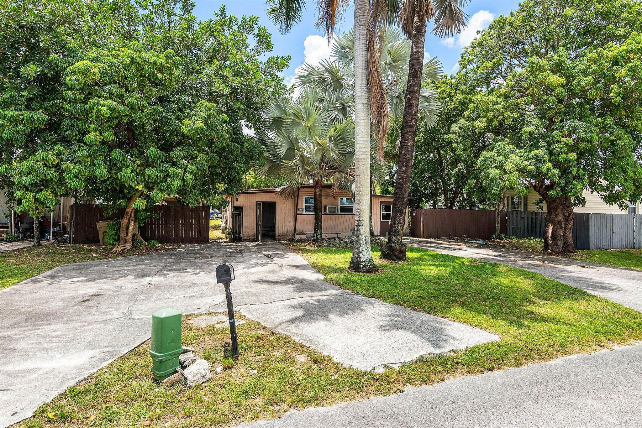 Endless potential in a prime Davie location! This manufactured home sits on an 8,959 sq ft lot and is ready for your vision. The existing structure is in need of a complete renovation. Whether you're looking to rebuild, renovate, or create your own custom space, this property offers a rare opportunity in a well-established neighborhood with no HOA.Conveniently located near top-rated schools, shopping, dining, and major highways. Land is owned--not leased. Don't miss your chance to transform this space into something special.Cash only estate sale As Is.