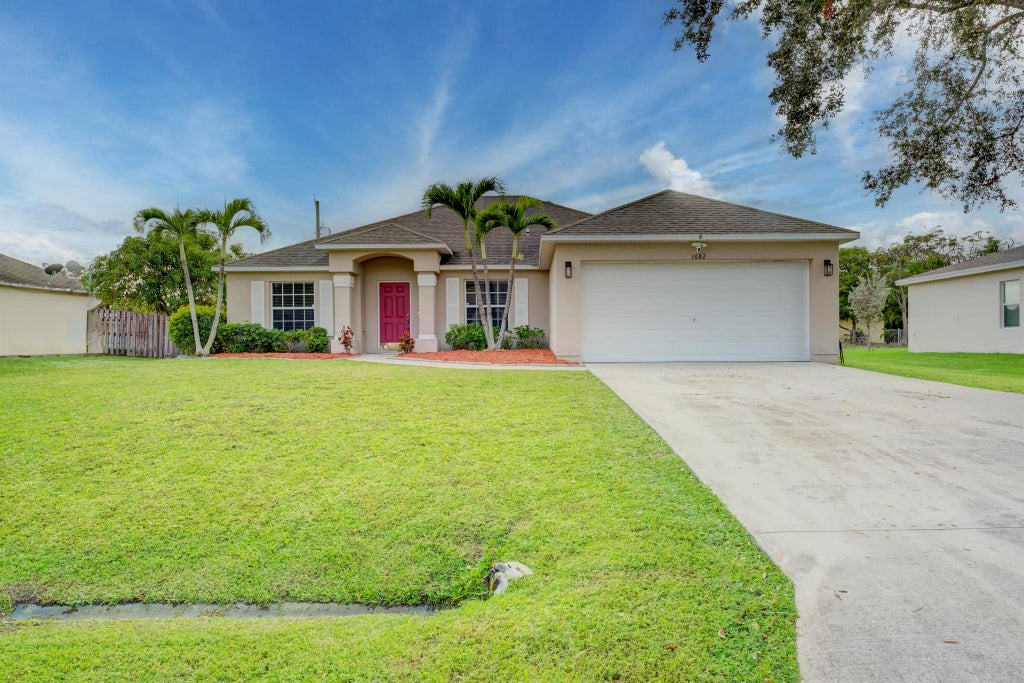 Photo of 1682 SE Harp Lane, Port St Lucie, FL 34983 (MLS # R10923873)