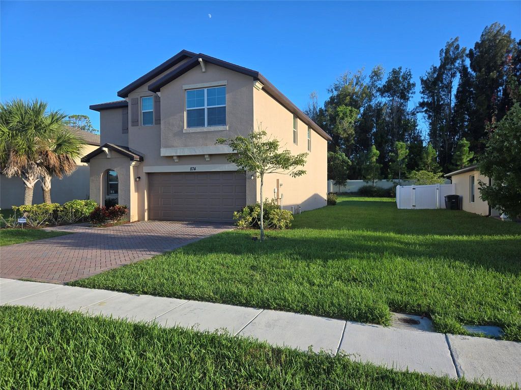 Photo of 874 Bent Creek Dr, Fort Pierce, FL 34947 (MLS # F10528000)