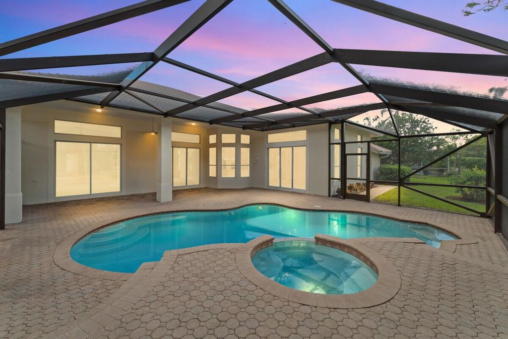 Photo of 4892 SW Hammock Creek Drive, Palm City, FL 34990 (MLS # R11117698)