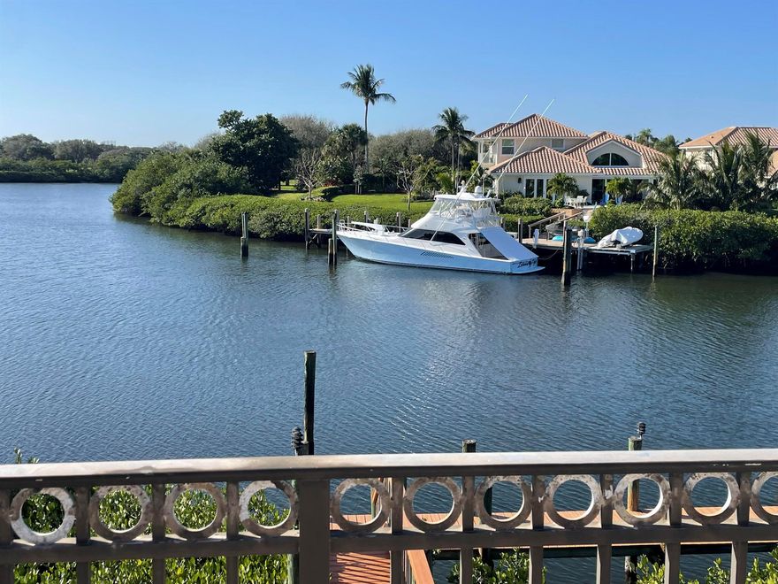 Nestled within the prestigious Barrows Island community of Jonathan's Landing in Jupiter, FL, this meticulously maintained home offers unparalleled waterfront living. Boasting over 3800 sq. ft. of luxurious living space, this residence features a chef-caliber kitchen and water frontage on a private, protected canal, making it a true boater's paradise. Enjoy direct access to the Intracoastal Waterway and close proximity to the Jupiter Inlet. The inviting living area opens to a patio, seamlessly blending indoor and outdoor living spaces. The Florida lifestyle is epitomized with a stunning inground pool, perfect for both relaxation and entertainment. Combining luxury, comfort, and convenience, this home is situated in one of Jupiter's most sought-after locations, offering a truly