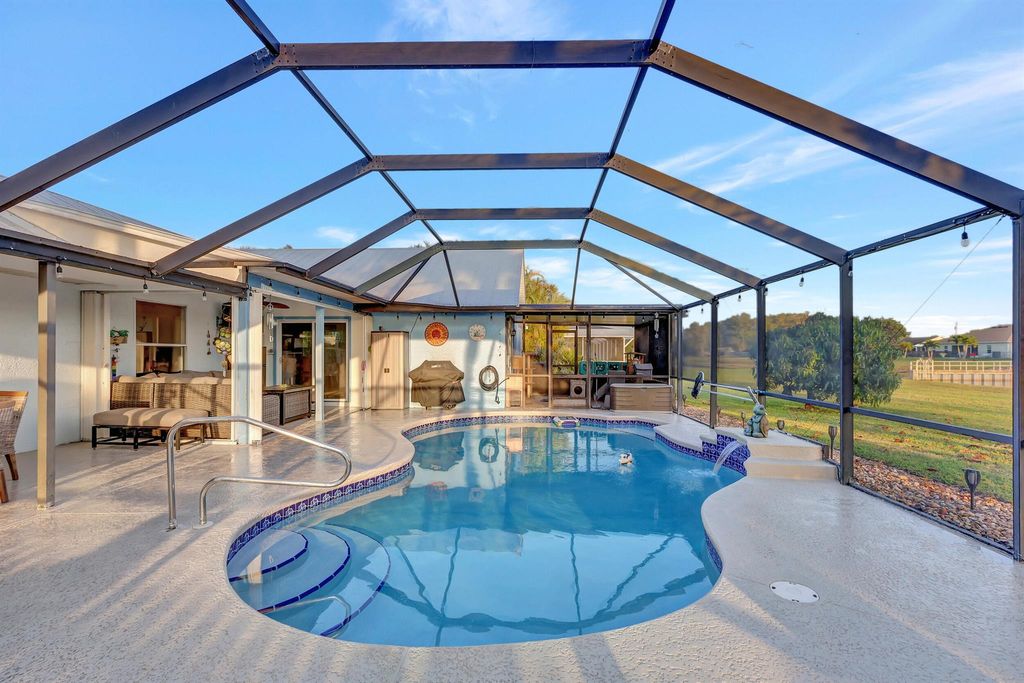 Photo of 4972 NW Foxworth Avenue, Port Saint Lucie, FL 34983 (MLS # R10963541)