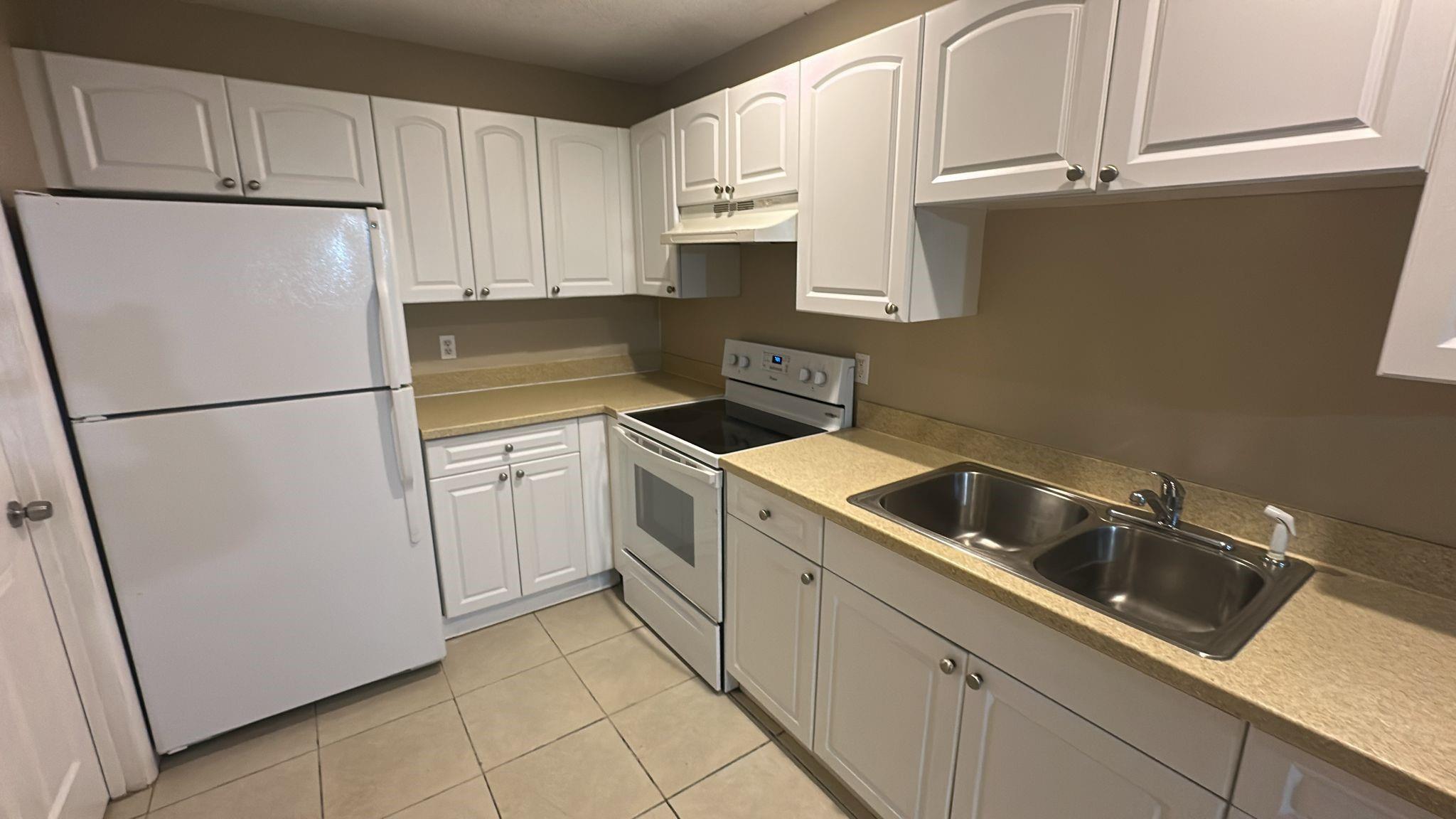 Welcome Home to a Move-In Ready Villa! Explore the charm of this spacious 1 bedroom, 1.5 bath villa conveniently situated on a single floor. This well-maintained unit boasts a half bath and a convenient washer/dryer hookup for added ease. There is also a common laundry facility in the community. Enjoy your private retreat with a semi-private walled-in patio – perfect for relaxation. This villa presents an excellent opportunity with new appliances, and a fresh coat of paint throughout. NO CARPET The unit is vacant and easy to show. Don't miss out – make this villa your new home sweet home!