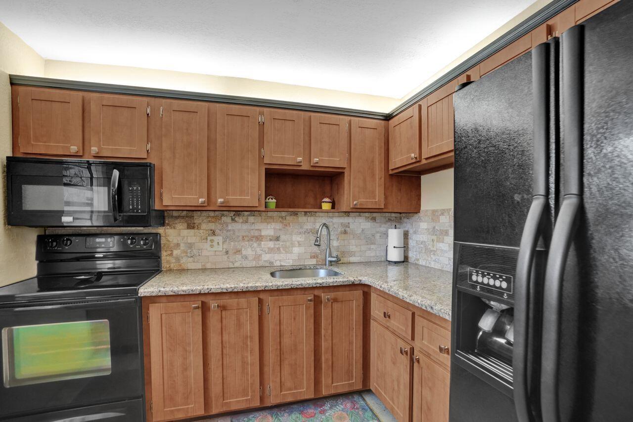 ORIOLE GOLF & TENNIS CLUB CONDO - Residential