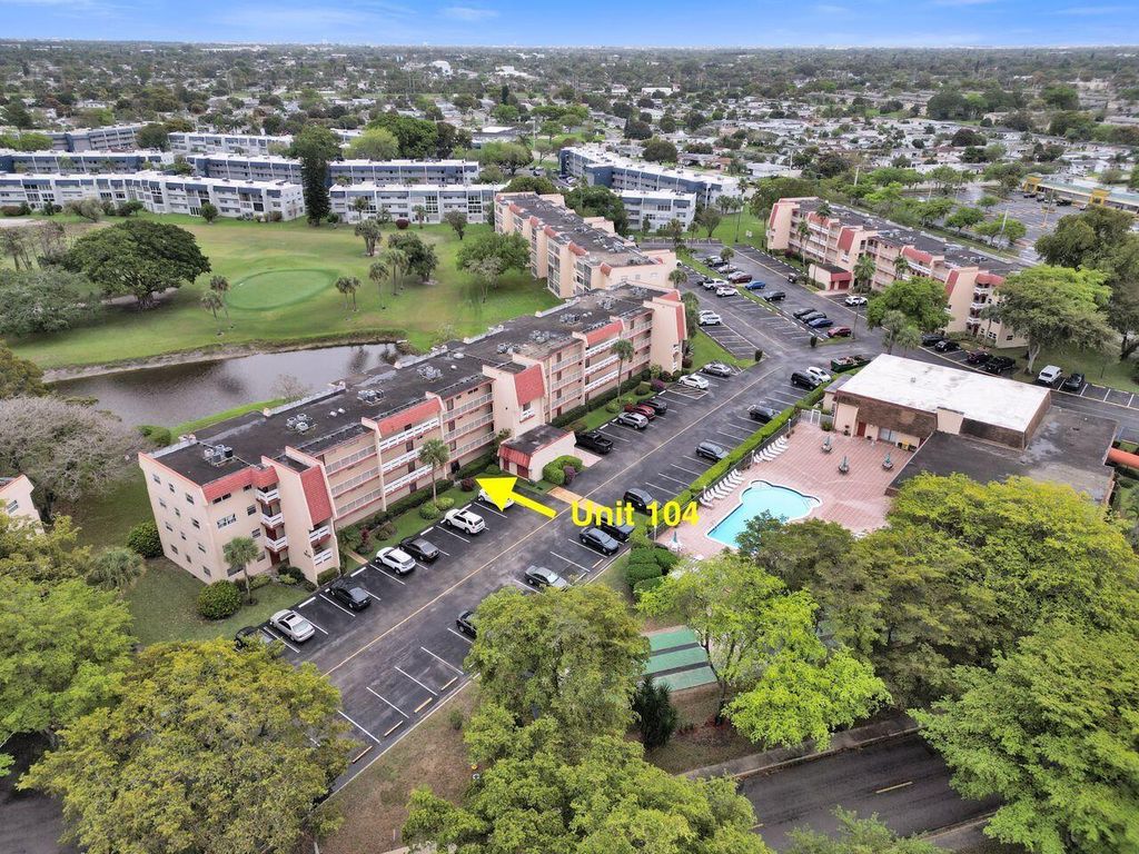 Photo of 1020 Country Club Drive #104, Margate, FL 33063 (MLS # B26005554)