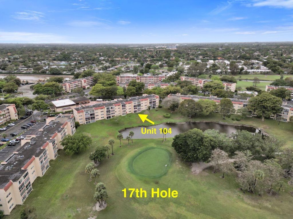 Photo of 1020 Country Club Drive #104, Margate, FL 33063 (MLS # B26005554)