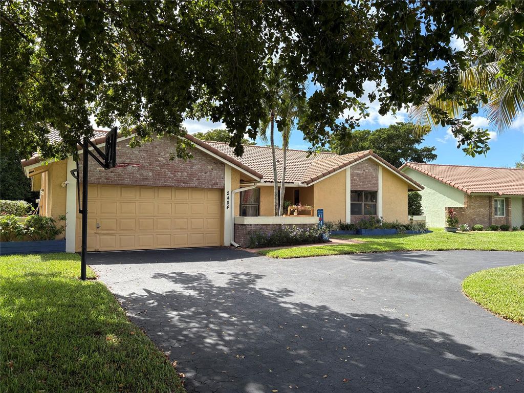 Photo of 2484 NW 88th Ter, Coral Springs, FL 33065 (MLS # F10532423)