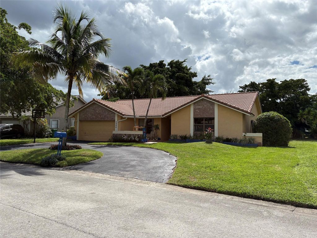 Photo of 2484 NW 88th Ter, Coral Springs, FL 33065 (MLS # F10532423)