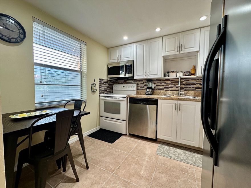 Welcome home to this beautifully updated 2-bedroom, 2-bath condo in the desirable Oriole Golf & Tennis Club, a sought-after 55+ community in Margate. Enjoy morning coffee in the enclosed patio and an open floor plan perfect for entertaining. The kitchen has been completely renovated and has a new dishwasher. The primary bathroom has a brand new vanity and updated flooring. Major upgrades include a new A/C and updated electrical panel, offering peace of mind and move-in-ready convenience. Residents enjoy access to a pool, clubhouse, and golf just steps away. Ideally located near shopping, dining, and everyday essentials such as Publix. Renting allowed after 2 years. No pets. Schedule your private showing today.